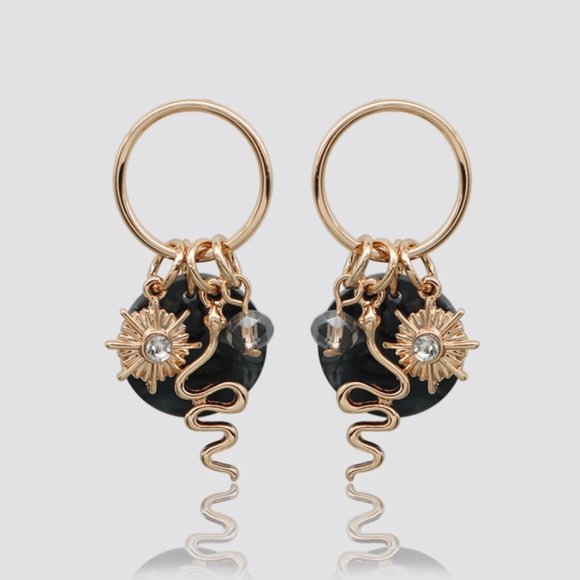 Anthropologie Jewelry - Antropologie Sun Snake Charm Earrings